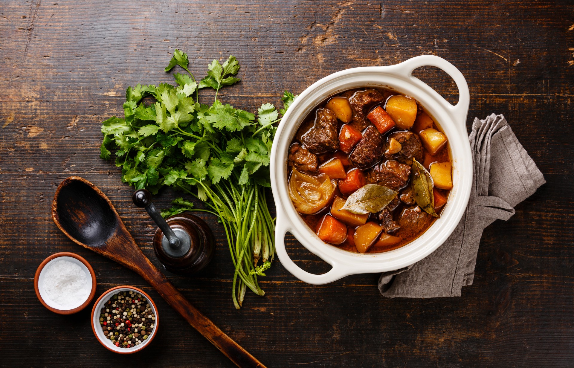 Beef meat stewed with potatoes in pot